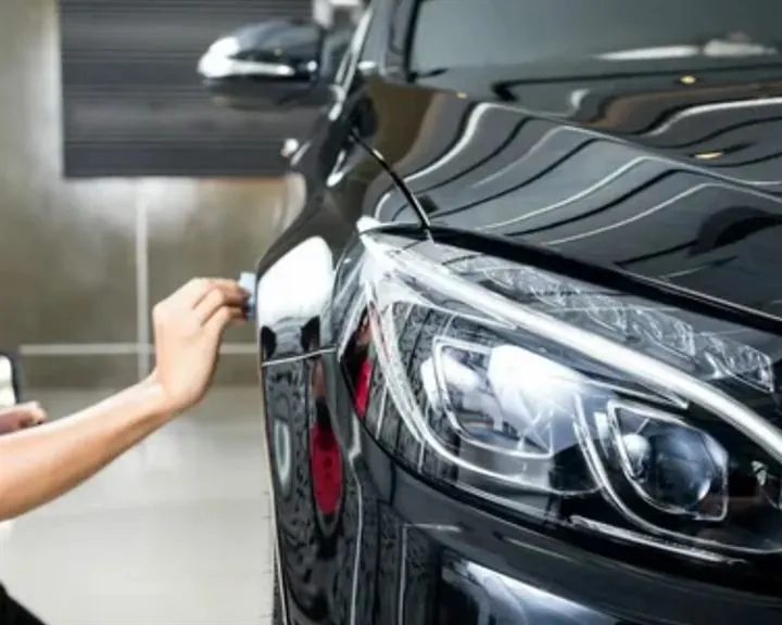 Graphene coating applied around a black car headlight